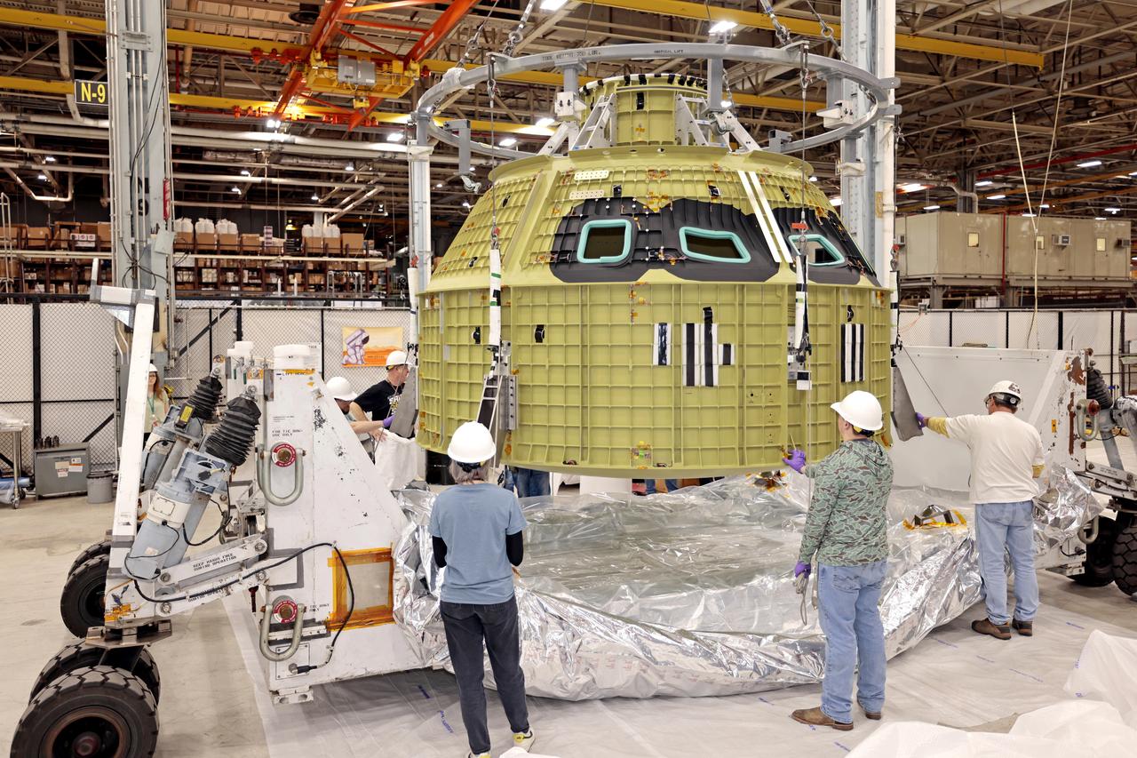 Teams at NASA’s Michoud Assembly Facility in New Orleans prepare the completed Orion pressure vessel for the Artemis IV mission for shipment to NASA’s Kennedy Space Center in Florida. The pressure vessel, which was assembled by lead contractor, Lockheed Martin, is the Orion crew module primary structure – the core upon which all other elements of Orion’s crew module are integrated. The structure is critical to Artemis crews as it holds the pressurized atmosphere astronauts breathe and work in a while in the vacuum of deep space. Once the module arrives at Kennedy’s Vehicle Assembly Building high bay, teams will begin integration of the pressure vessel with the Orion spacecraft crew module adapter and other assembly. With Artemis missions, NASA will land the first woman and the first person of color on the lunar surface, paving the way for human exploration of the Moon and on to Mars.  Image credit: NASA/Michael DeMocker